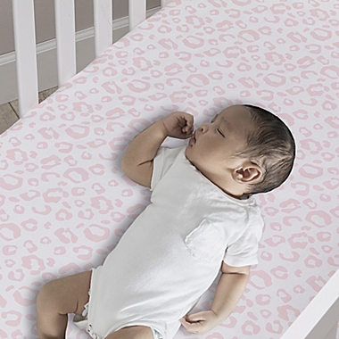Lambs &amp; Ivy&reg; Signature Separates Leopard Fitted Crib Sheet in Pink. View a larger version of this product image.