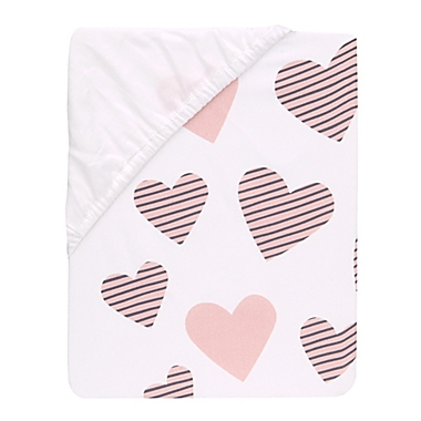 Lambs &amp; Ivy&reg; Heart To Heart Fitted Crib Sheet in Pink/White. View a larger version of this product image.