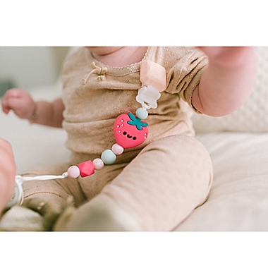 Loulou Lollipop&reg; Darling Strawberry Pacifier Clip in Pink. View a larger version of this product image.