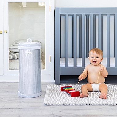 Ubbi&reg; Diaper Pail in Grey Wood Grain. View a larger version of this product image.