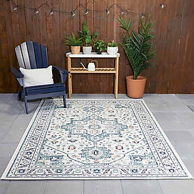Destination Summer Miami Border 5&#39;3 x 6&#39;11 Indoor/Outdoor Area Rug in Aqua. View a larger version of this product image.