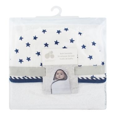 Just Born&reg; Pom Pom Swaddle in Navy/White. View a larger version of this product image.
