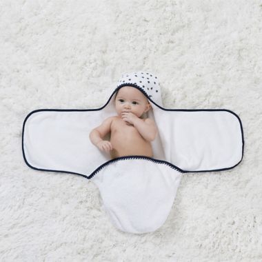 Just Born&reg; Pom Pom Swaddle in Navy/White. View a larger version of this product image.