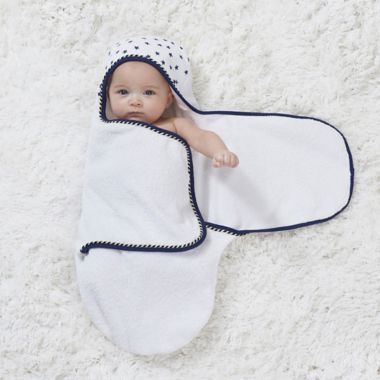 Just Born&reg; Pom Pom Swaddle in Navy/White. View a larger version of this product image.