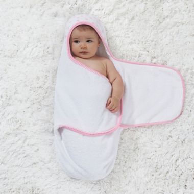 Just Born&reg; Pom Pom Swaddle in Pink/White. View a larger version of this product image.