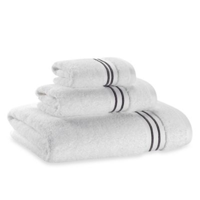 white towels with green trim