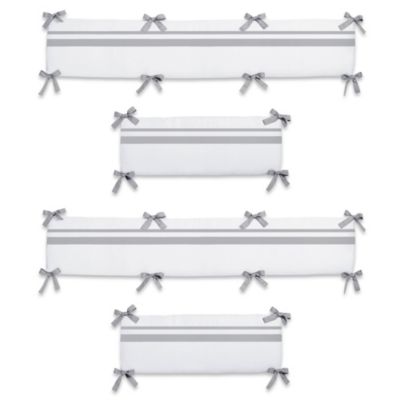 grey and white cot bumper