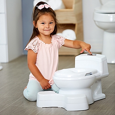 The First Years&trade; Super Pooper&trade; Plus Potty Training Seat in White. View a larger version of this product image.