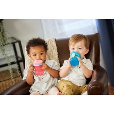 The First Years&reg; 7 oz. Teething Spout Trainer Cup in Blue. View a larger version of this product image.