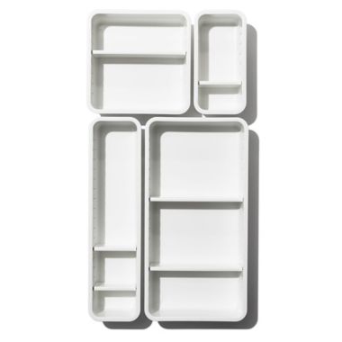 OXO&reg; Good Grips 4-Piece Adjustable Drawer Bin Set in White. View a larger version of this product image.