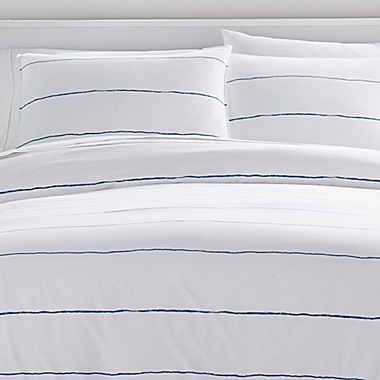 City Scene&reg; Tideline 2-Piece Reversible Twin Comforter Set in White/Navy. View a larger version of this product image.