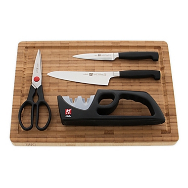 ZWILLING Four Star 5-Piece Kitchen Knife Set with Knife Sharpener and Cutting Board. View a larger version of this product image.