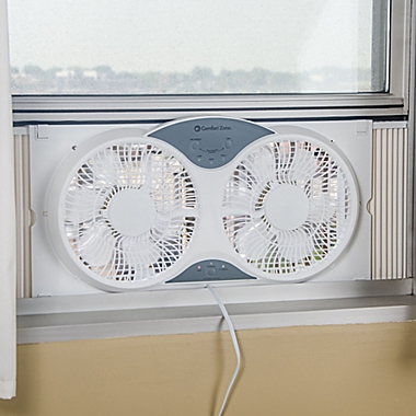Comfort Zone&reg; CZ310R Reversible Twin Window Fan in White. View a larger version of this product image.