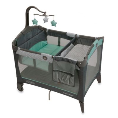 newborn sleeping in pack n play bassinet