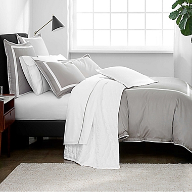 Under the Canopy&reg; Hotel Border Organic Cotton 2-Piece Twin Duvet Cover Set in White/Ivory. View a larger version of this product image.