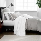 Alternate image 1 for Under the Canopy&reg; Hotel Border Organic Cotton European Pillow Sham in White/Ivory