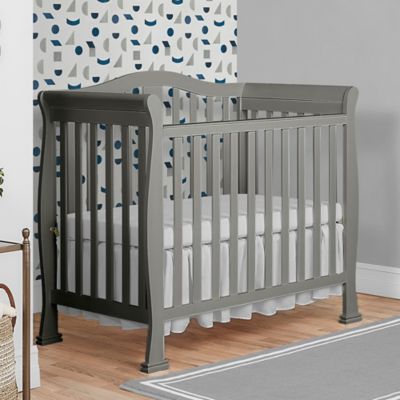 grey mini crib