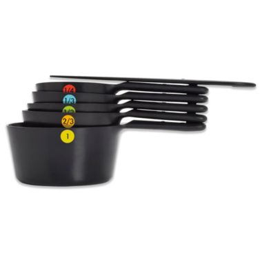 OXO Good Grips&reg; 6-Piece Plastic Measuring Cups in Black. View a larger version of this product image.