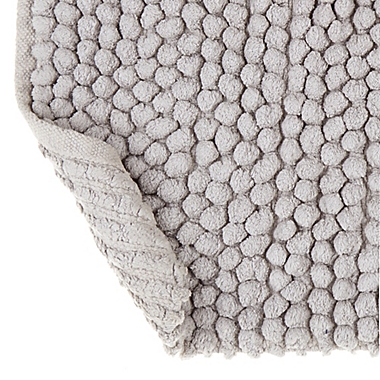 Haven&trade; Pebble 21&quot; x 34&quot; Bath Rug in Harbor Mist Grey. View a larger version of this product image.
