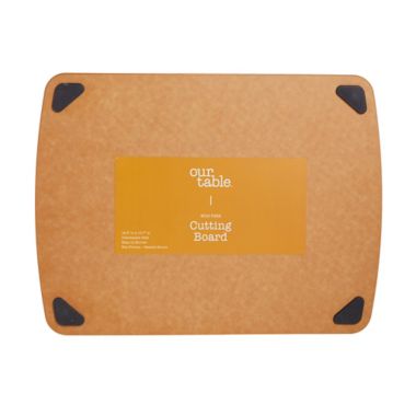 Our Table&trade; 10.7-Inch x 14.5-Inch Wood Fiber Cutting Board with Silicone Feet. View a larger version of this product image.