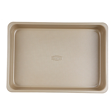 Our Table&trade; 9-Inch x 13-Inch Textured Cake Pan in Beige. View a larger version of this product image.