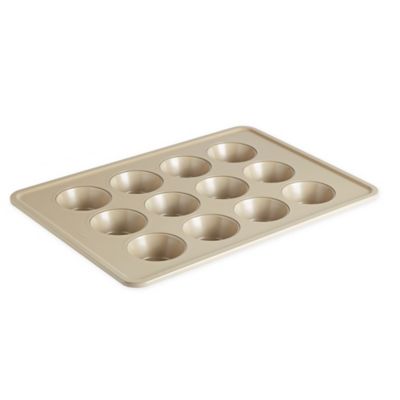 Our Table&trade; 12-Cup Textured Muffin Pan in Beige