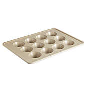 Our Table&trade; 12-Cup Textured Muffin Pan in Beige