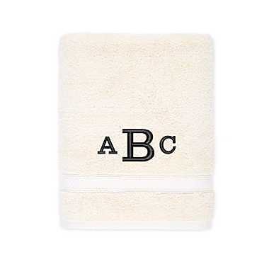 Nestwell&trade; Hygro Monogram Cotton Solid Bath Towel in Alabaster Yellow. View a larger version of this product image.