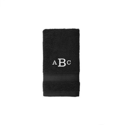Nestwell&trade; Hygro Monogram Cotton Solid Fingertip Towel in Jet Black
