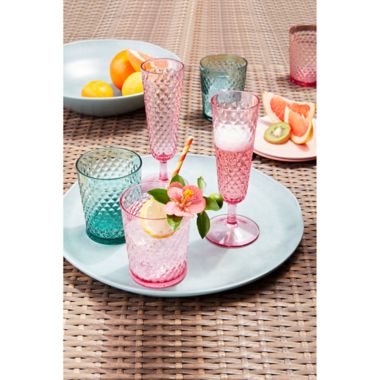 Bee &amp; Willow&trade; Textured Champagne Flute in Pink. View a larger version of this product image.