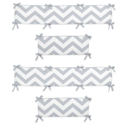 grey and white cot bumper