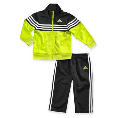 yellow adidas tracksuit black stripes