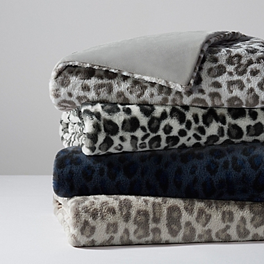 UGG&reg; Polar Faux Fur Throw Blanket in Ocean Leopard. View a larger version of this product image.