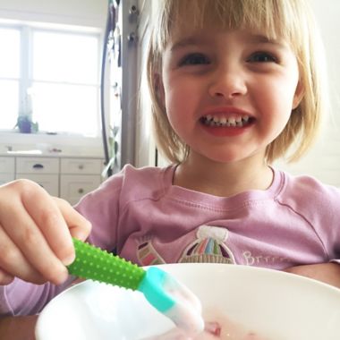 Silikids&reg; 2-Pack Silicone Feeding Spoons&trade; in Purple/Green. View a larger version of this product image.