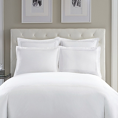 Wamsutta&reg; Baratta Stitch Cotton Standard Pillow Sham in White. View a larger version of this product image.