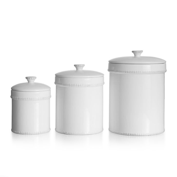 white canister set with black writing