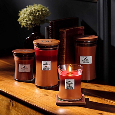 WoodWick&reg; Trilogy Autumn Harvest 9.7 oz. Hourglass Candle. View a larger version of this product image.