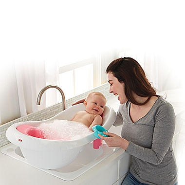 Fisher-Price&reg; 4-in-1 Sling n Seat Bath Tub in Pink/White. View a larger version of this product image.