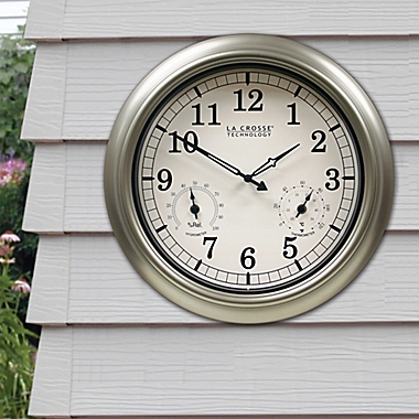 La Crosse Technology Indoor/Outdoor Wall Clock with Temperature & Humidity in Silver. View a larger version of this product image.