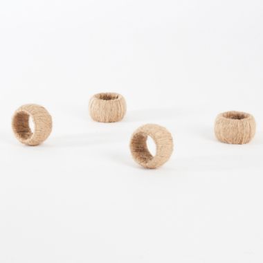 Saro Lifestyle Jute Napkin Rings in Natural (Set of 4). View a larger version of this product image.