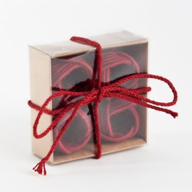 Saro Lifestyle Braided Jute Napkin Rings in Red (Set of 4). View a larger version of this product image.