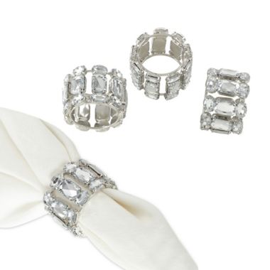 Saro Lifestyle Acrylic Napkin Rings in Clear (Set of 4). View a larger version of this product image.