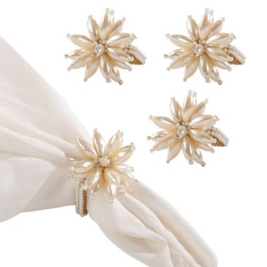 Saro Lifestyle Pearl Flower Napkin Rings in Ivory (Set of 4). View a larger version of this product image.