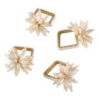 Alternate image 1 for Saro Lifestyle Pearl Flower Napkin Rings in Ivory (Set of 4)