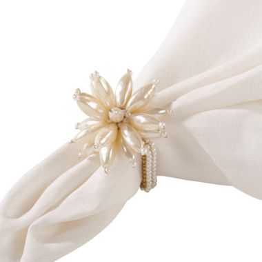 Saro Lifestyle Pearl Flower Napkin Rings in Ivory (Set of 4). View a larger version of this product image.