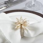 Alternate image 3 for Saro Lifestyle Pearl Flower Napkin Rings in Ivory (Set of 4)