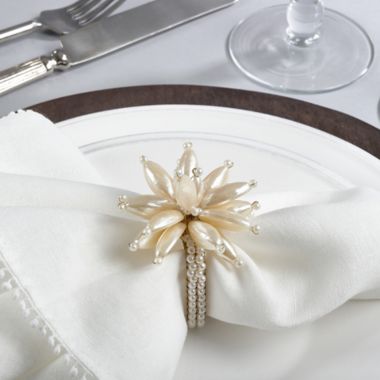 Saro Lifestyle Pearl Flower Napkin Rings in Ivory (Set of 4). View a larger version of this product image.