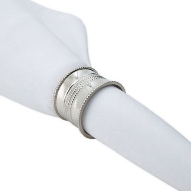 Saro Lifestyle Dotted Napkin Rings in Silver (Set of 4). View a larger version of this product image.