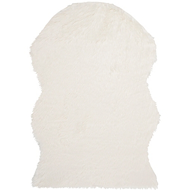 Safavieh Faux Sheep Skin Hide 5-Foot x 7-Foot Area Rug in Ivory. View a larger version of this product image.