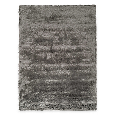 Safavieh Faux Sheep Skin 5-Foot x 7-Foot Area Rug in Grey. View a larger version of this product image.
